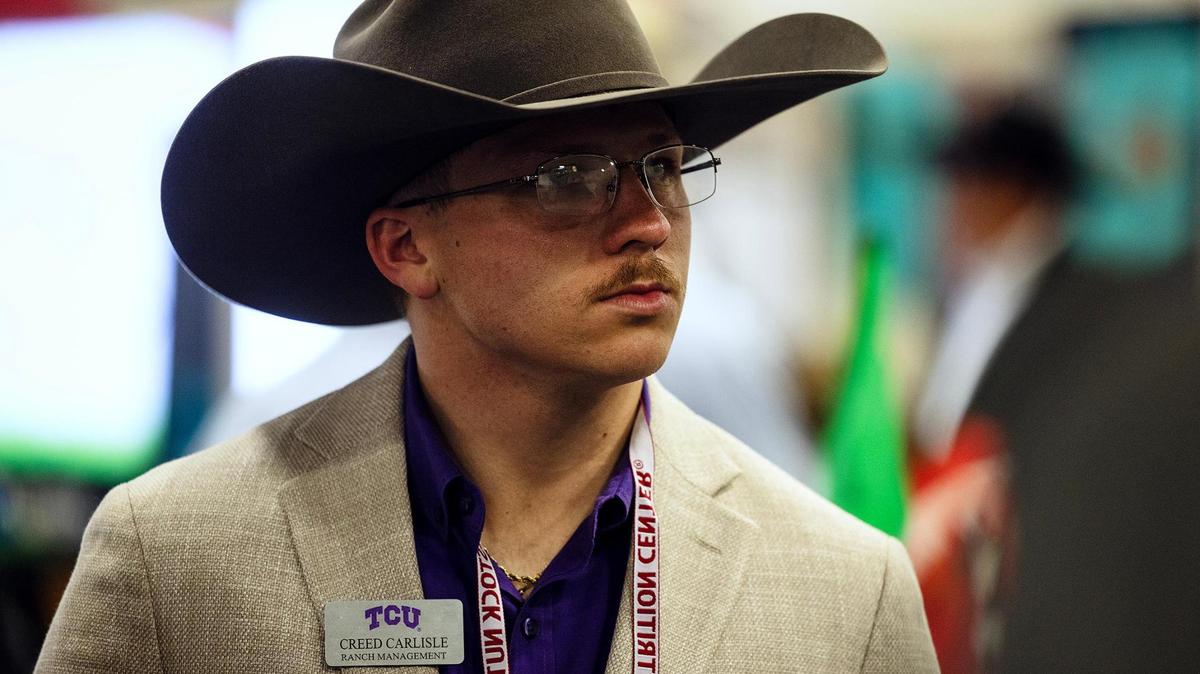 TCU student Creed Carlisle browses the booths present at the Cattle Raisers Expo and Convention at the Fort Worth Convention Center in April.