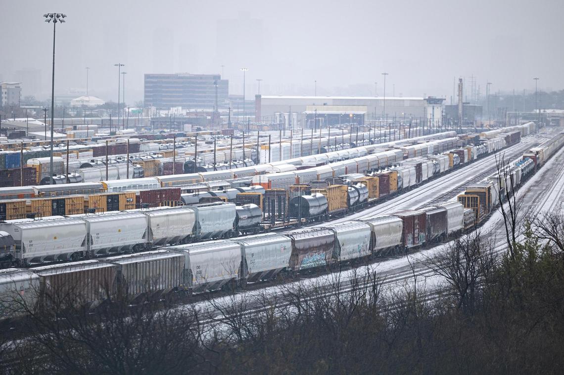 Snow covers the tops of cargo trains on the Union Pacific Railroad in Fort Worth on Thursday, Jan. 9, 2025.