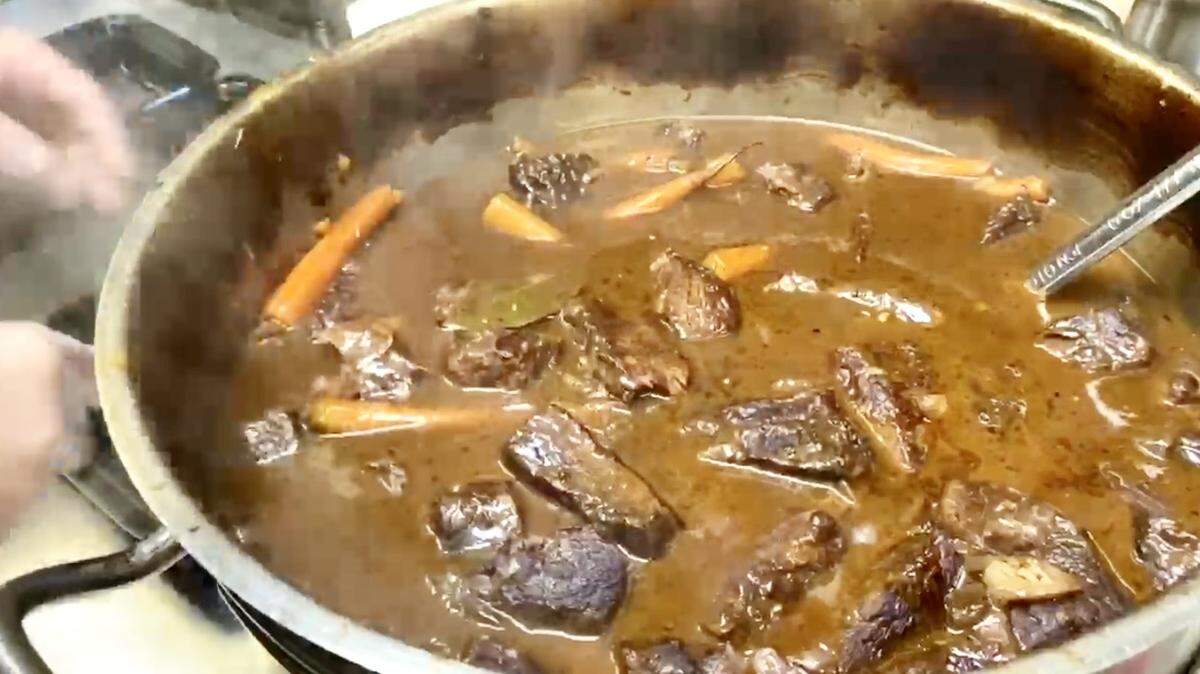 Beef bourgignon is a family-style takeout dinner at Paris 7th.