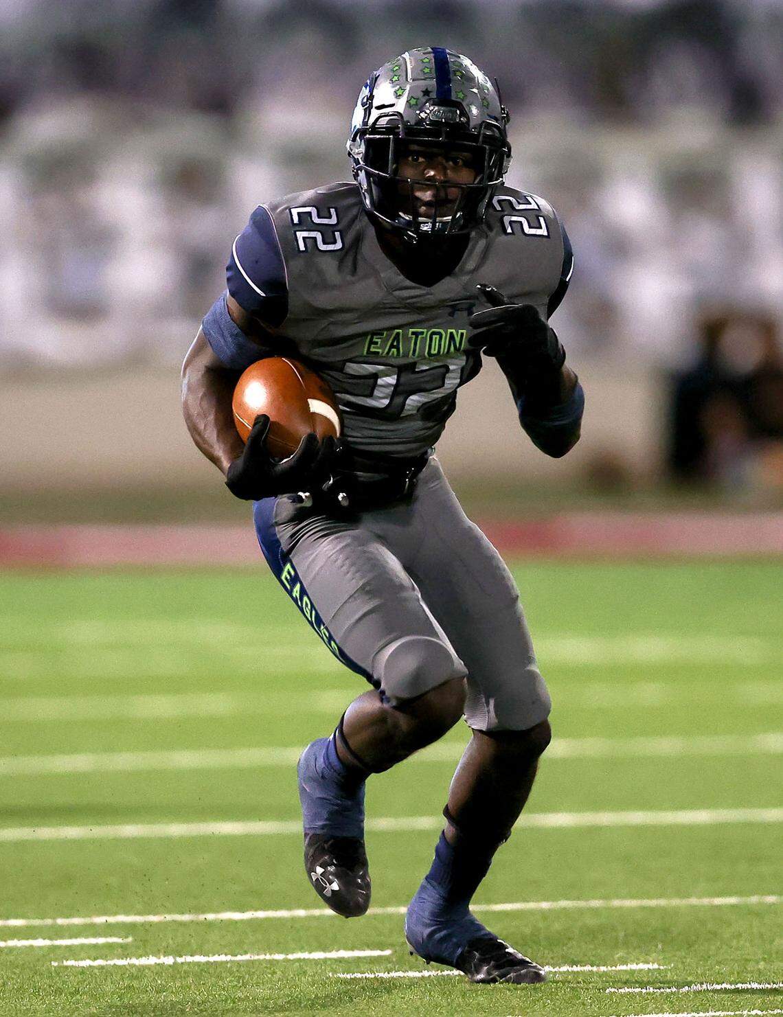 Eaton running back JB Brown (22) looks for room to run against Southlake Carroll during the first half in a District 4-6A high school football game played at Northwest ISD Stadium on Thursday, October 21, 2021, in Justin. (Steve Nurenberg/Special to the Star-Telegram)