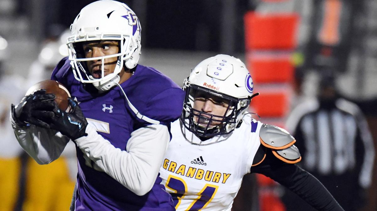 Saginaw Chisholm Trail receiver Jalique Martin, left, in action during last week’s game against Granbury, had six catches for 85 yards and a touchdown Thursday night during a 27-14 victory over Fort Worth South Hills.