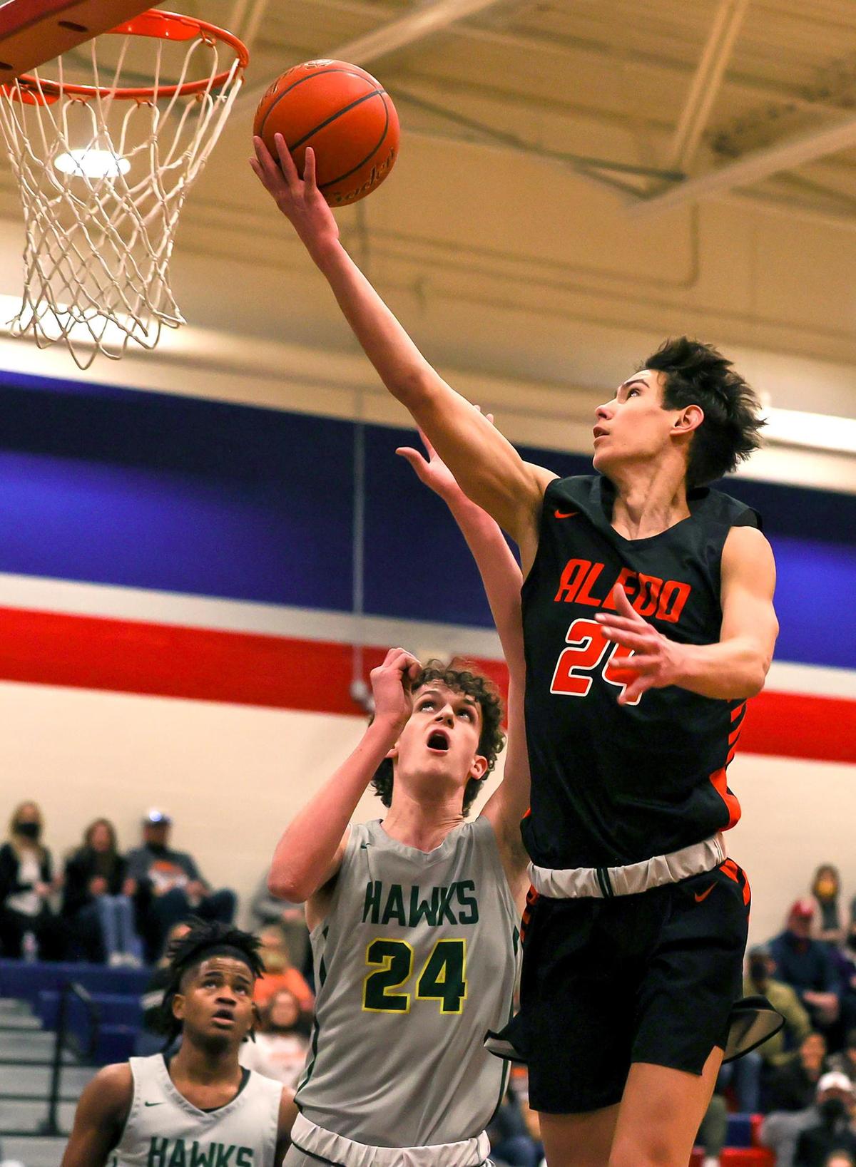 Aledo guard Daniel Sohn (24) goes to the basket for two-points against Birdville during the first half of a 5A Bi-district Boys High School Basketball game played at Richland High School, February 20, 2021 in North Richland Hills, Tx. (Steve Nurenberg Special to the Star-Telegram)