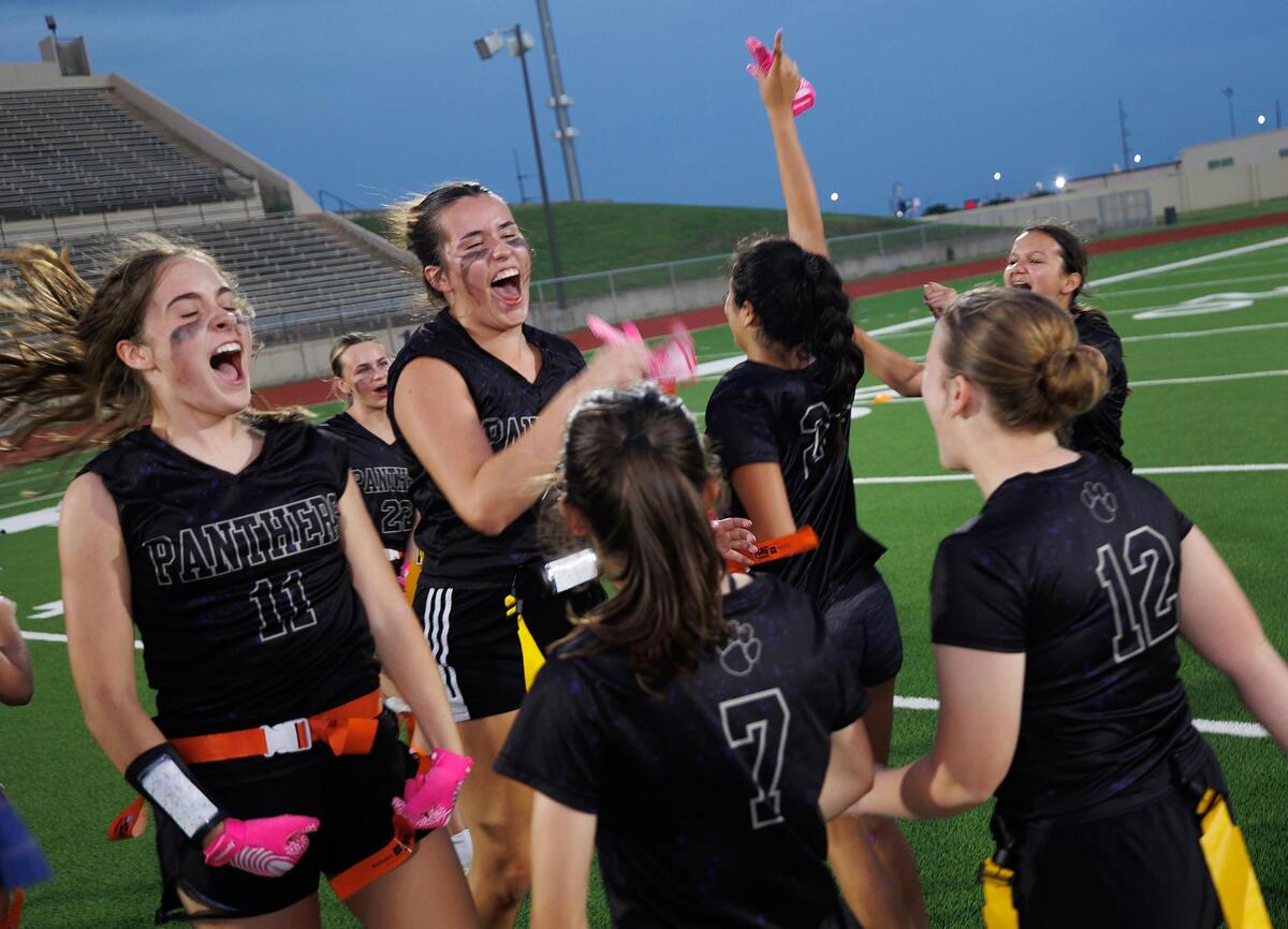 The Paschal Panthers celebrate their victory over Arlington Heights during the FWISD girls flag football championship on Tuesday, May 13, 2025, at Herman Clark Stadium.