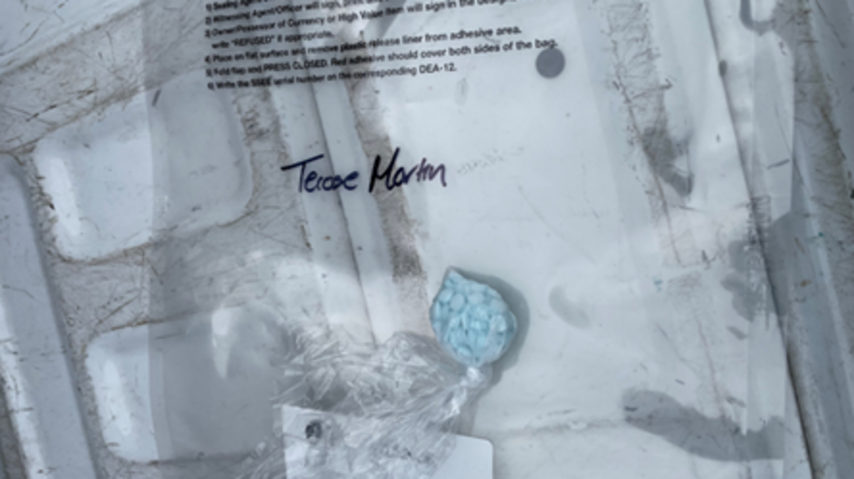Police officers found 88 fentanyl pills in a drug dealer’s pocket and 805 fentanyl pills at his apartment, along with two guns, during his arrest, authorities said.