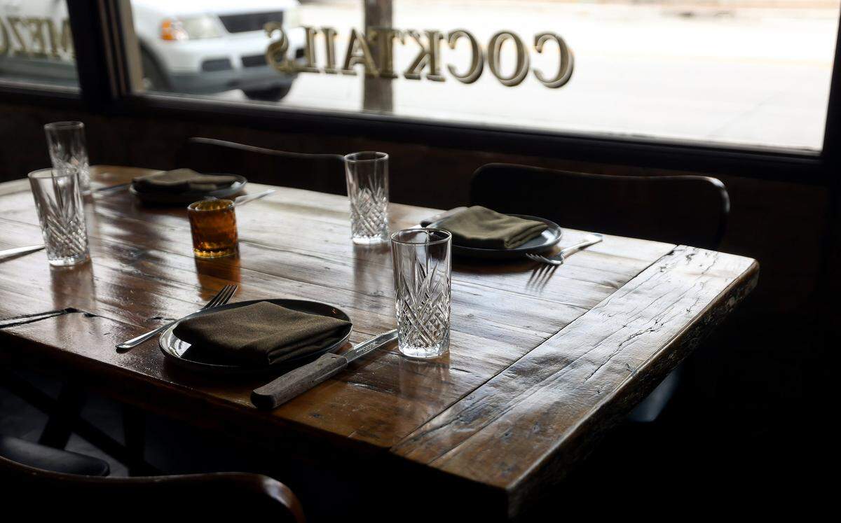 Light falls on a table setting at TInie's Mexican Cuisine on South Main Street in Fort Worth on Friday, April 10, 2026.
