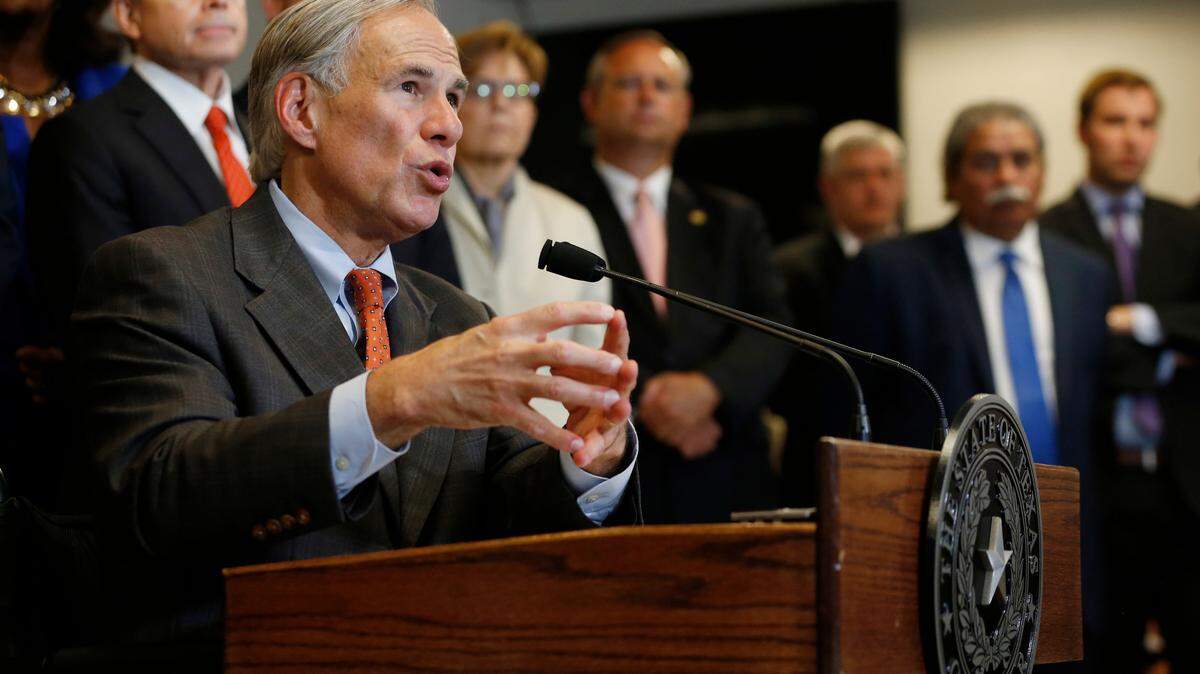 Gov. Greg Abbott unveils his plan to enhance school safety during a press conference at Dallas Independent School District headquarters on May. Abbott released a 43-page report following three days of mostly closed-door meetings with school district officials, shooting survivors and groups on both sides of the gun-control debate, among others.