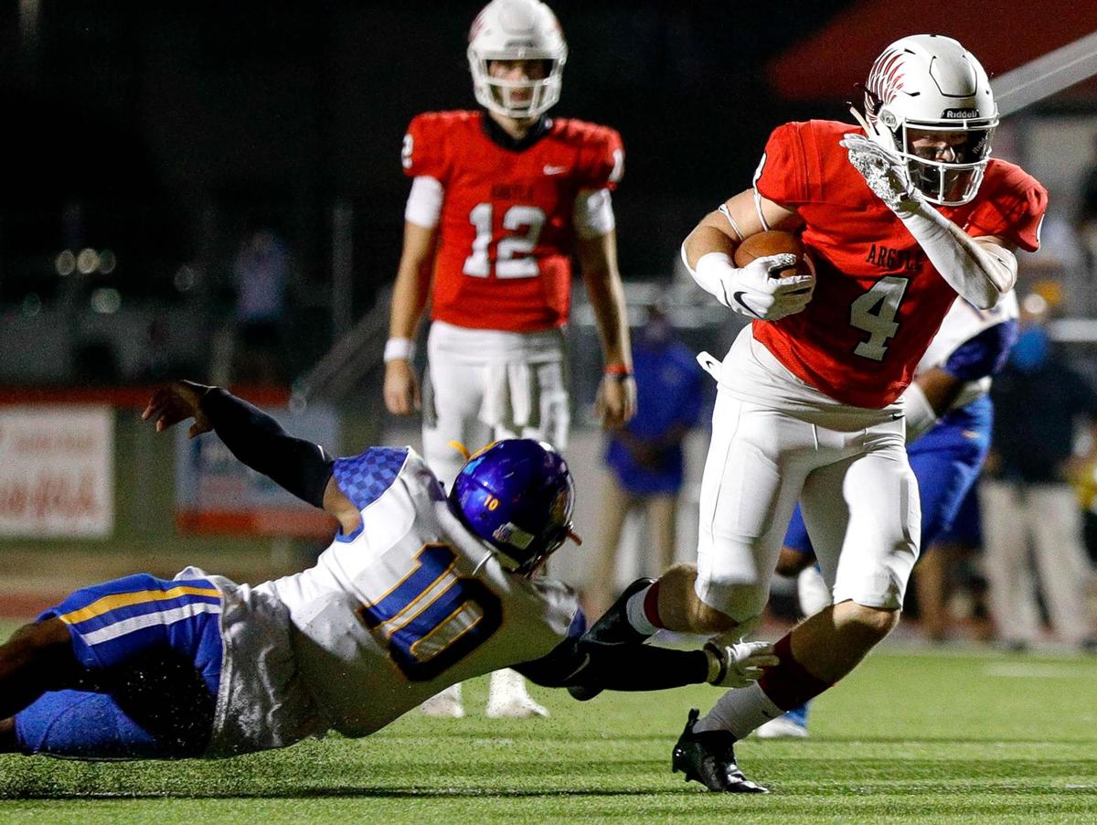 Argyle running back Knox Scoggins (4) gets past Waco La Vega linebacker Zamarion Johnson (10) during the second half, Friday night, September 18, 2020 played at Argyle High School in Argyle, Tx. (Steve Nurenberg Special to the Star-Telegram)