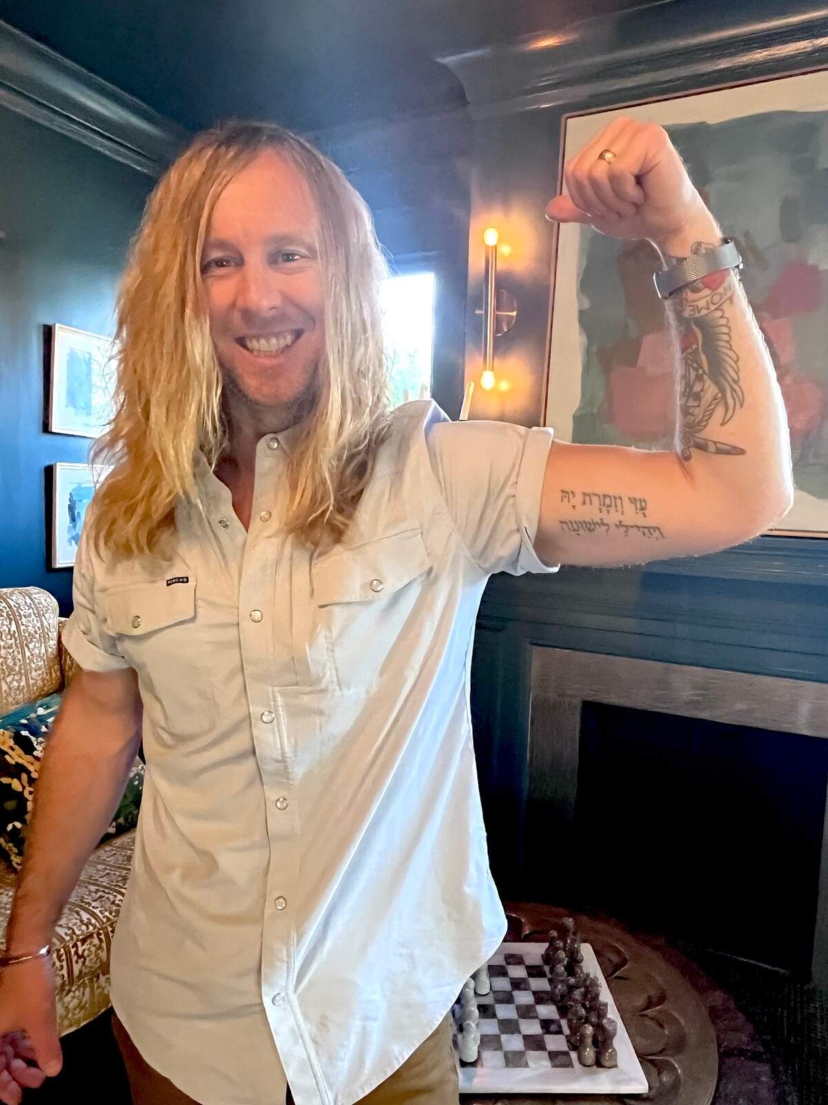 The tattoo on Jamey Ice’s arm has Hebrew lines from Exodus 15:2. Translated, the Biblical words mean, “God is my strength and my song and has been my deliverance.”