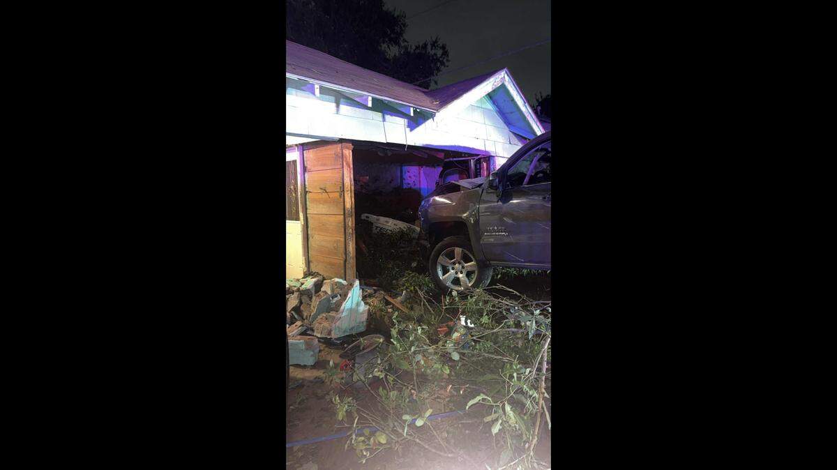 A Chevrolet Silverado crashed into the living room of a home in the 2600 block of Wallace Street in east Fort Worth early Sunday. Police say they are investigating the hit-and-run accident.