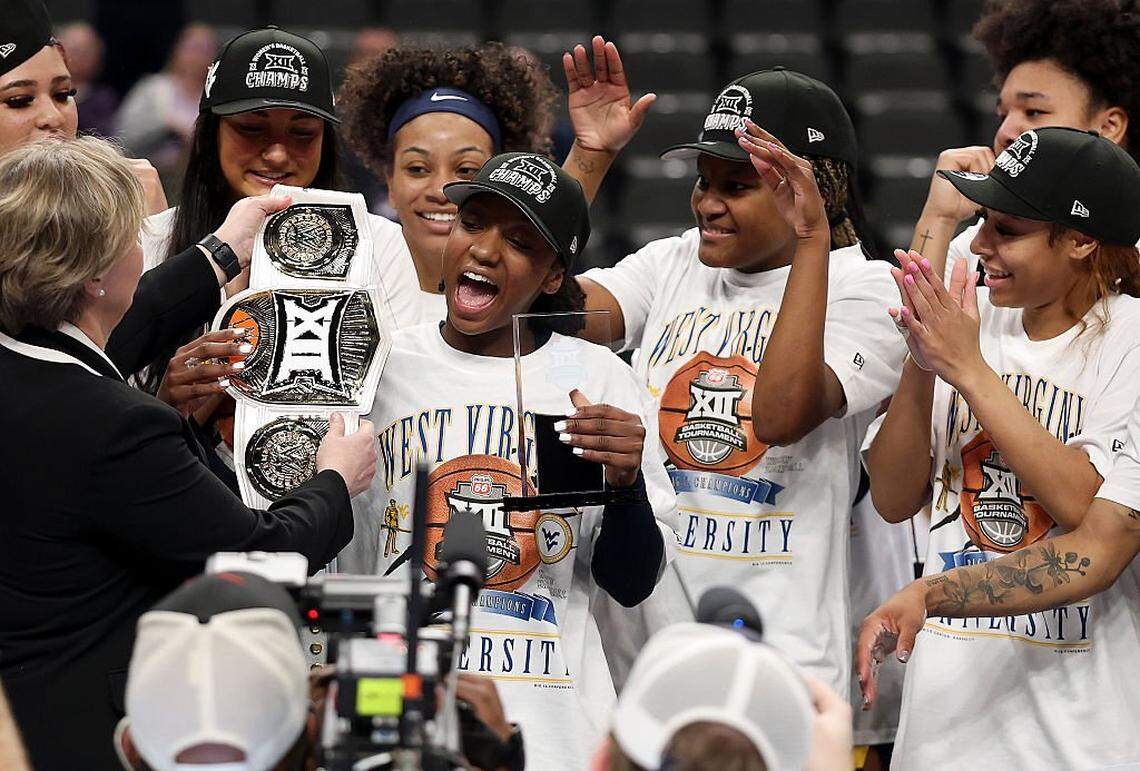 KANSAS CITY, MISSOURI - MARCH 08: Jordan Harrison #10 of the West Virginia Mountaineers celebrates with teammates as she is named tournament MVP after the Mountaineers defeated the TCU Horned Frogs to win the championship game of the 2026 Big 12 Women's Tournament at T-Mobile Center on March 08, 2026 in Kansas City, Missouri. (Photo by Jamie Squire/Getty Images)