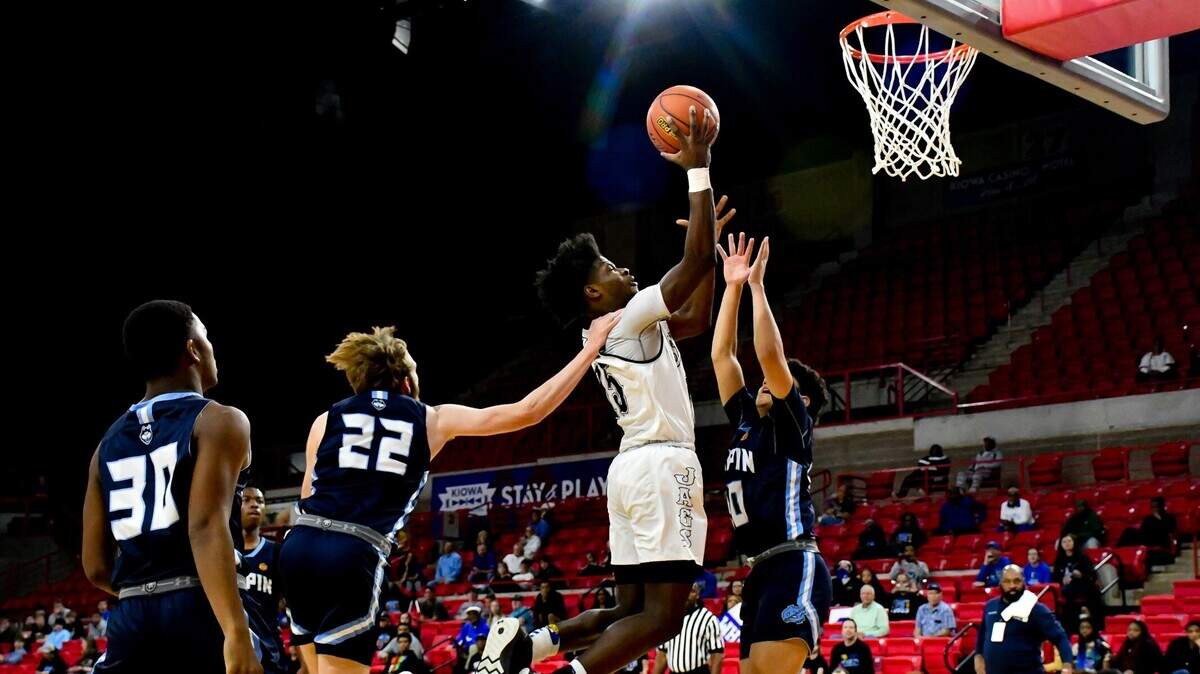 Mansfield Summit’s Richard Lemboye goes up for two of his 14 points in the Class 5A Region I championship on Saturday, March 4, 2023 at the Yeager Coliseum in Wichita Falls, Texas. Lemboye was named the tournament MVP.