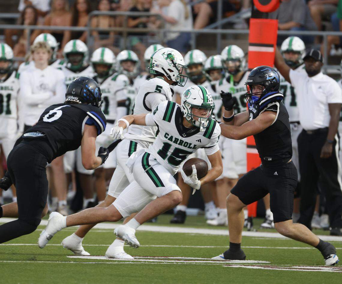 Southlake wide receiver Caden Mackey (15) splits the Byron Nelson defense for yardage during the first half of a UIL football game between Southlake Carroll  and Byron Nelson at Northwest ISD Stadium in Justin, Texas, Friday, Sept. 12, 2025.
