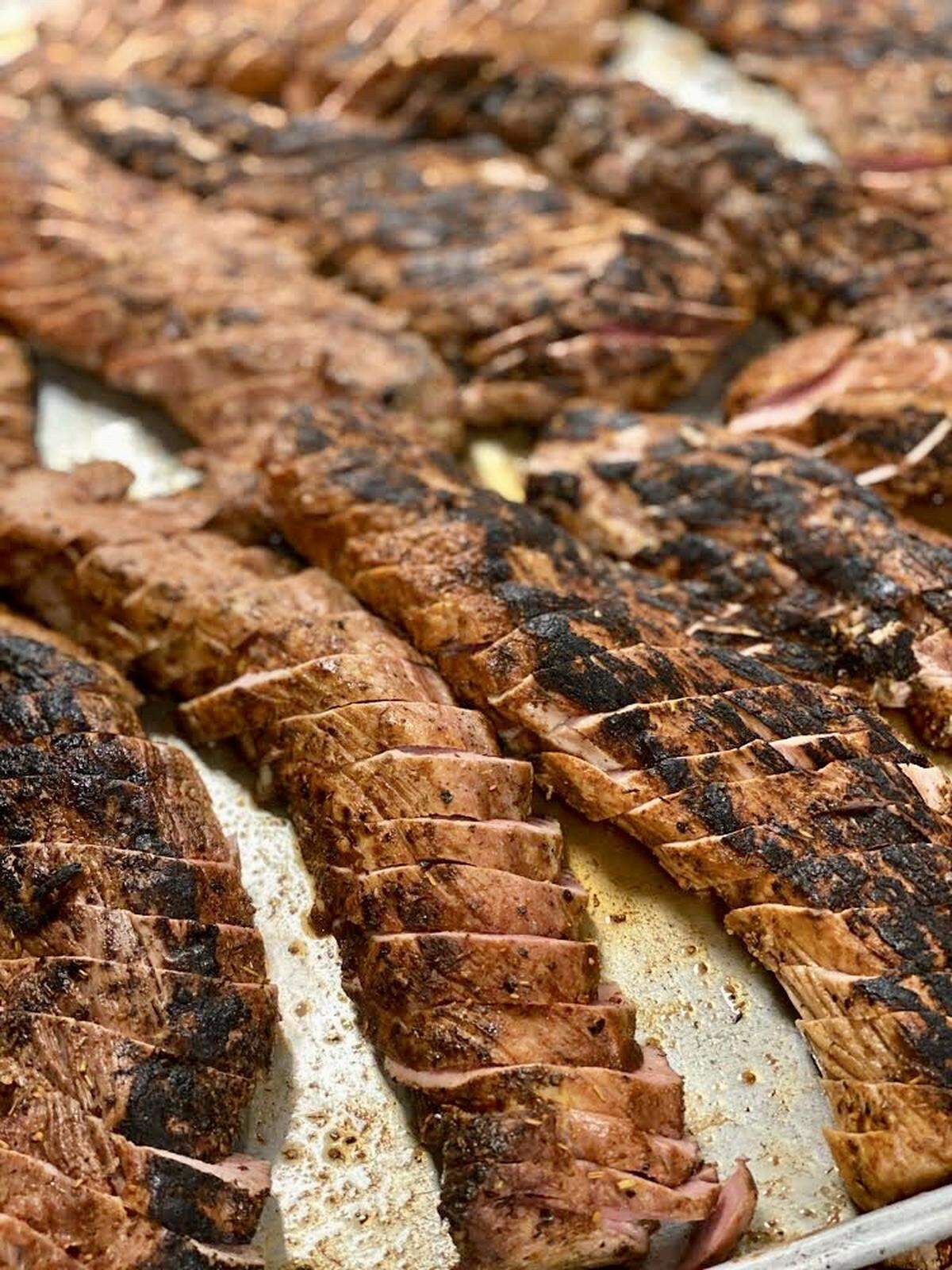 Pork tenderloin is one of four entrees in chef Tim Love’s family dinner package.