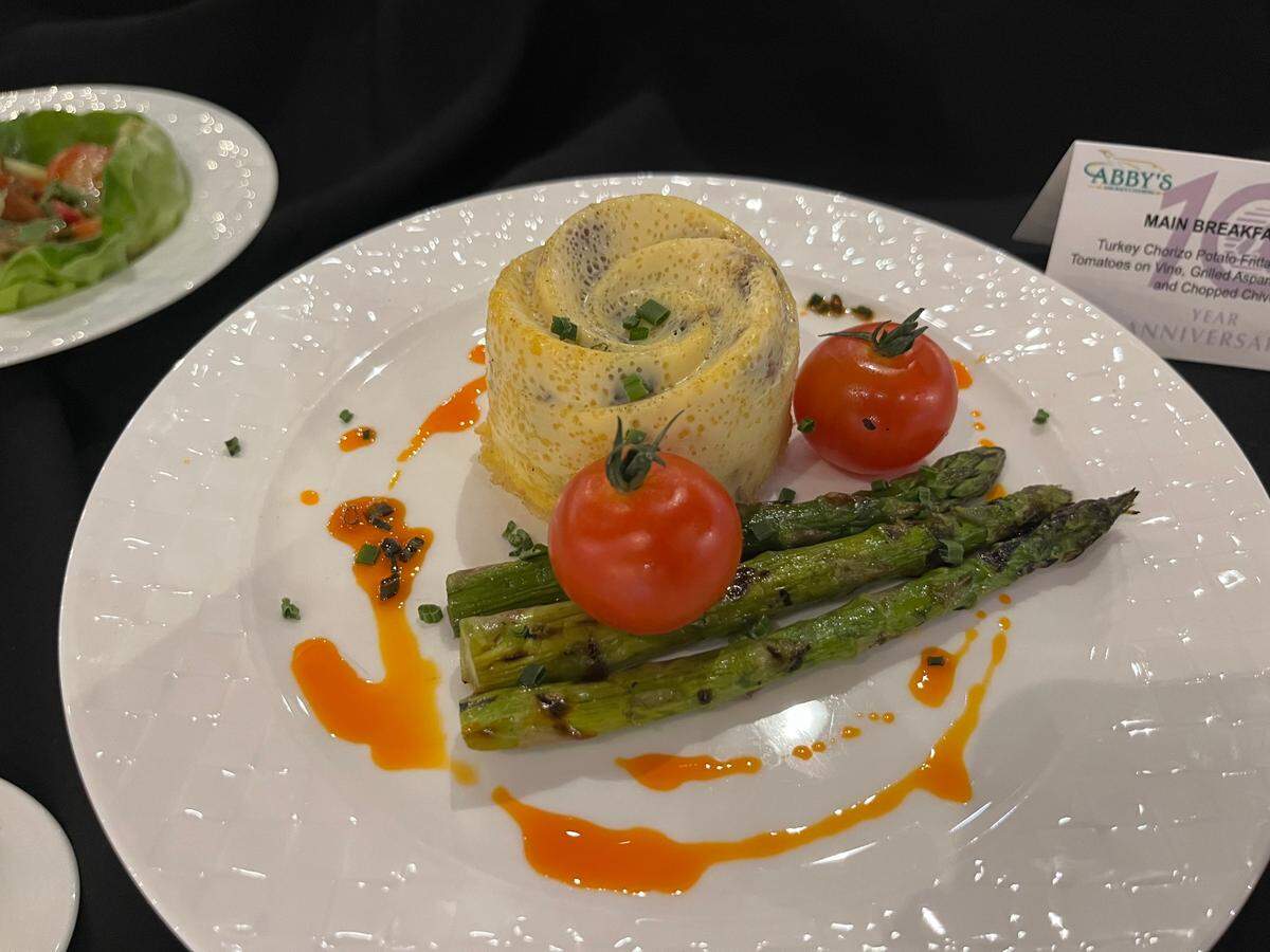 Turkey chorizo potato frittata, one of the business class breakfast options that guests can add caviar to on board Qatar flight from DFW.