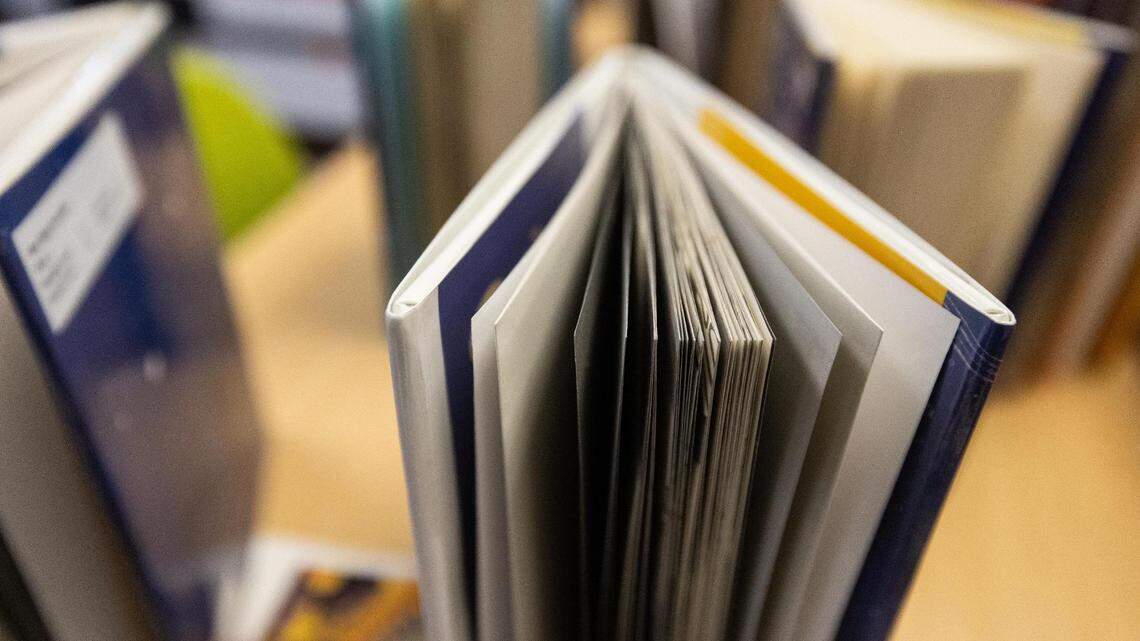 An archive photo of books in the library at M.H. Moore Elementary School in Fort Worth. The Fort Worth Independent School District is in the process of returning books to library shelves that were pulled months ago for review of sexual or violent content.