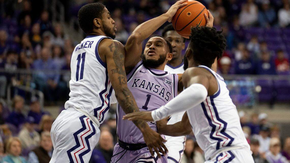 Kansas State guard Markquis Nowell (1) drives to the basket between TCU’s Rondel Walker (11) and Mike Miles Jr., on Jan. 14, 2023. The two teams play again on Tuesday. 