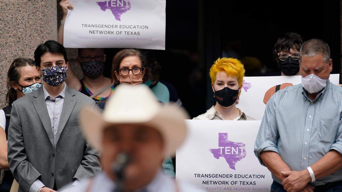 Parents of transgender children and other supporters of transgender rights gathered in the capital outdoor rotunda last year to speak about transgender legislation being considered in the Texas House and Texas Senate.