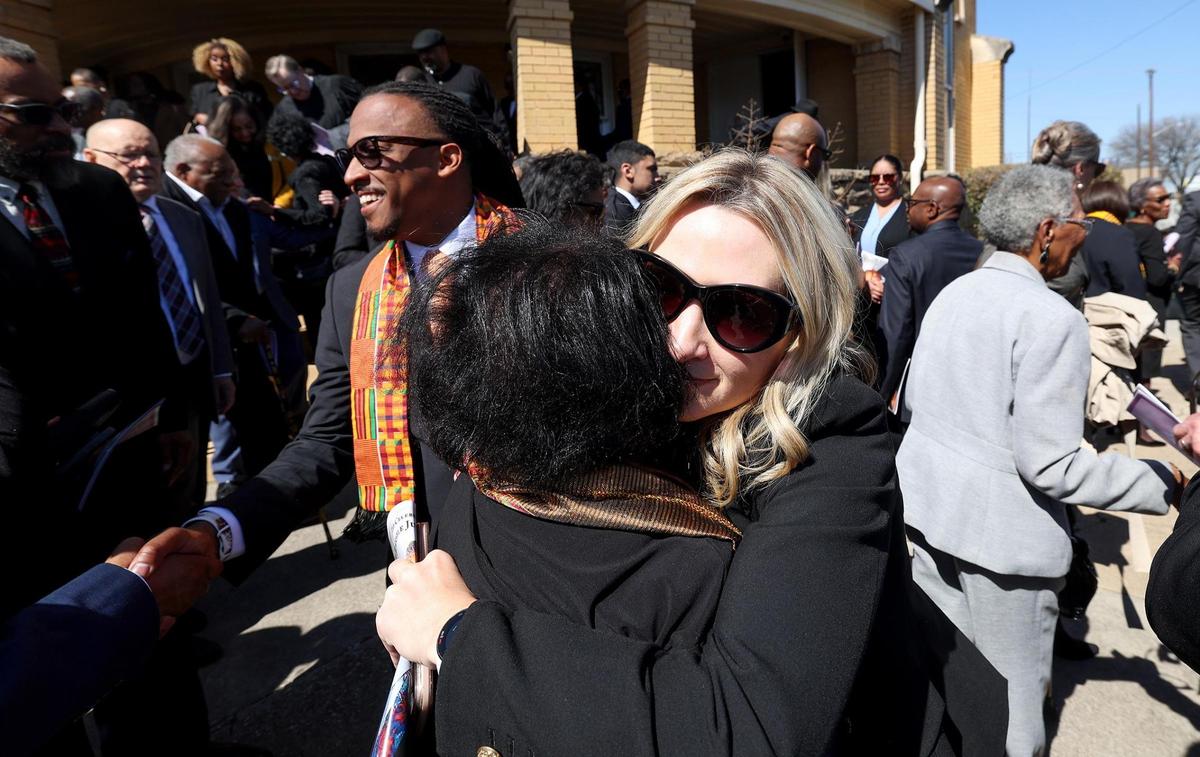 Fort Worth Mayor Mattie Parker hugs Judge Clifford Davis’ oldest daughter, Avis, while with council member Chris Nettles, left, at Davis’ funeral on Tuesday, Feb. 25, at Saint Andrews United Methodist Church in Fort Worth. Davis, the first Black district judge to be elected in Tarrant County, left a long legacy behind including his work to desegregate North Texas schools.