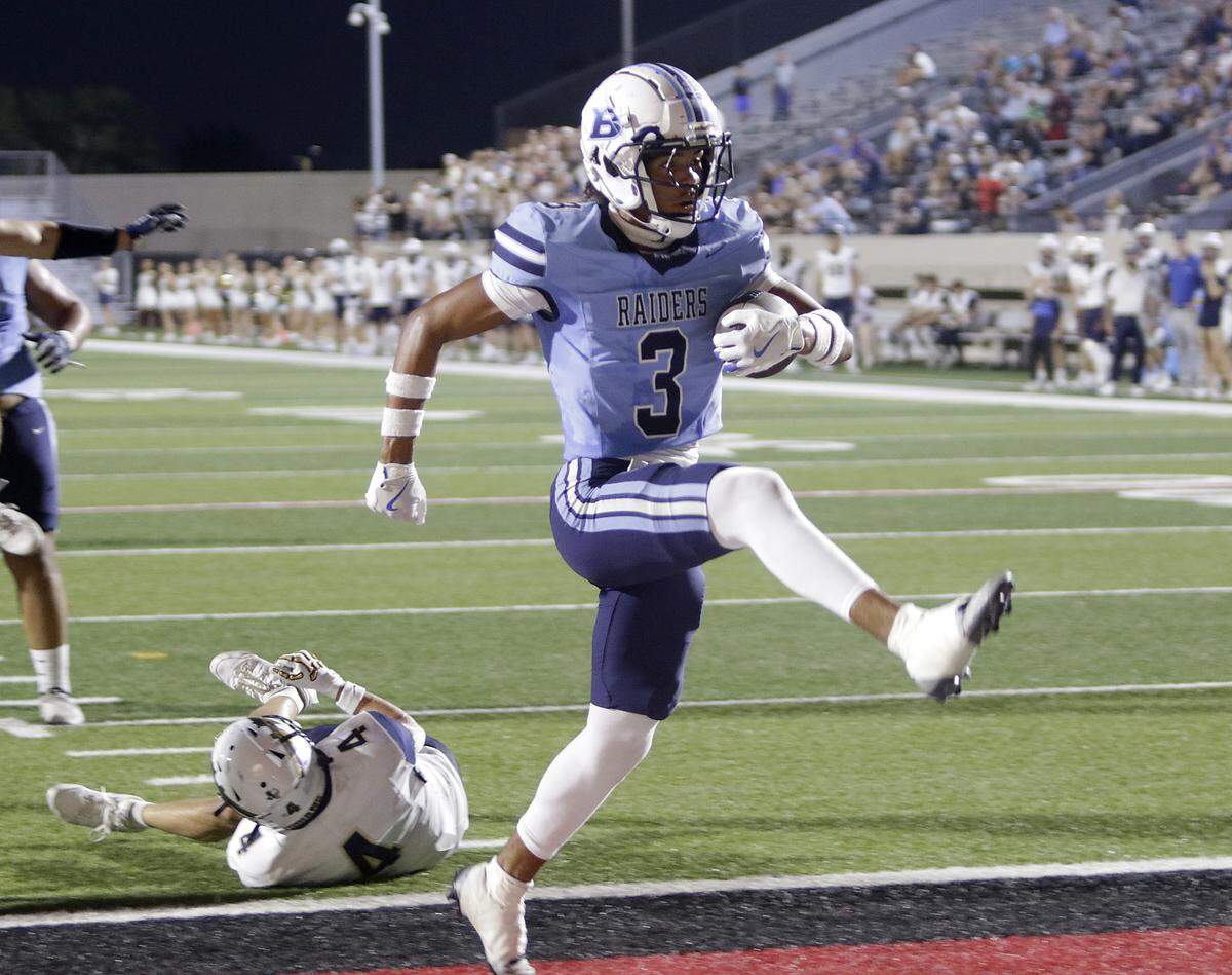 L.D. Bell’s Braelon Solomon high steps after scoring a touchdown against Keller during their game at Pennington Field on Friday, Sept. 19, 2025 