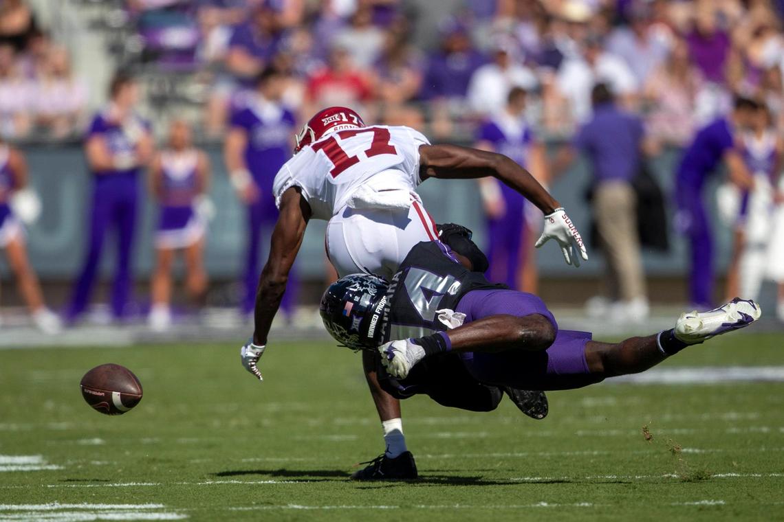TCU safety Abraham Camara tackles OU slot receiver Marvin Mims Jr. at the Amon G. Carter Stadium in Fort Worth, Texas, on Saturday, Oct. 1, 2022.