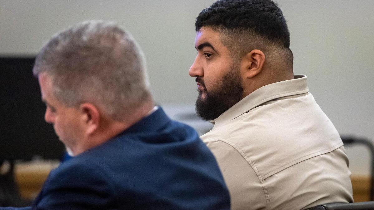 Defendant Peter Cardona sits with his lawyer during trial at the Tim Curry Criminal Justice Center in Fort Worth on Feb. 14, 2023. Cardona was sentenced Tuesday after he was convicted of murder for the 2020 shooting of Alfredo Olivares, 19.