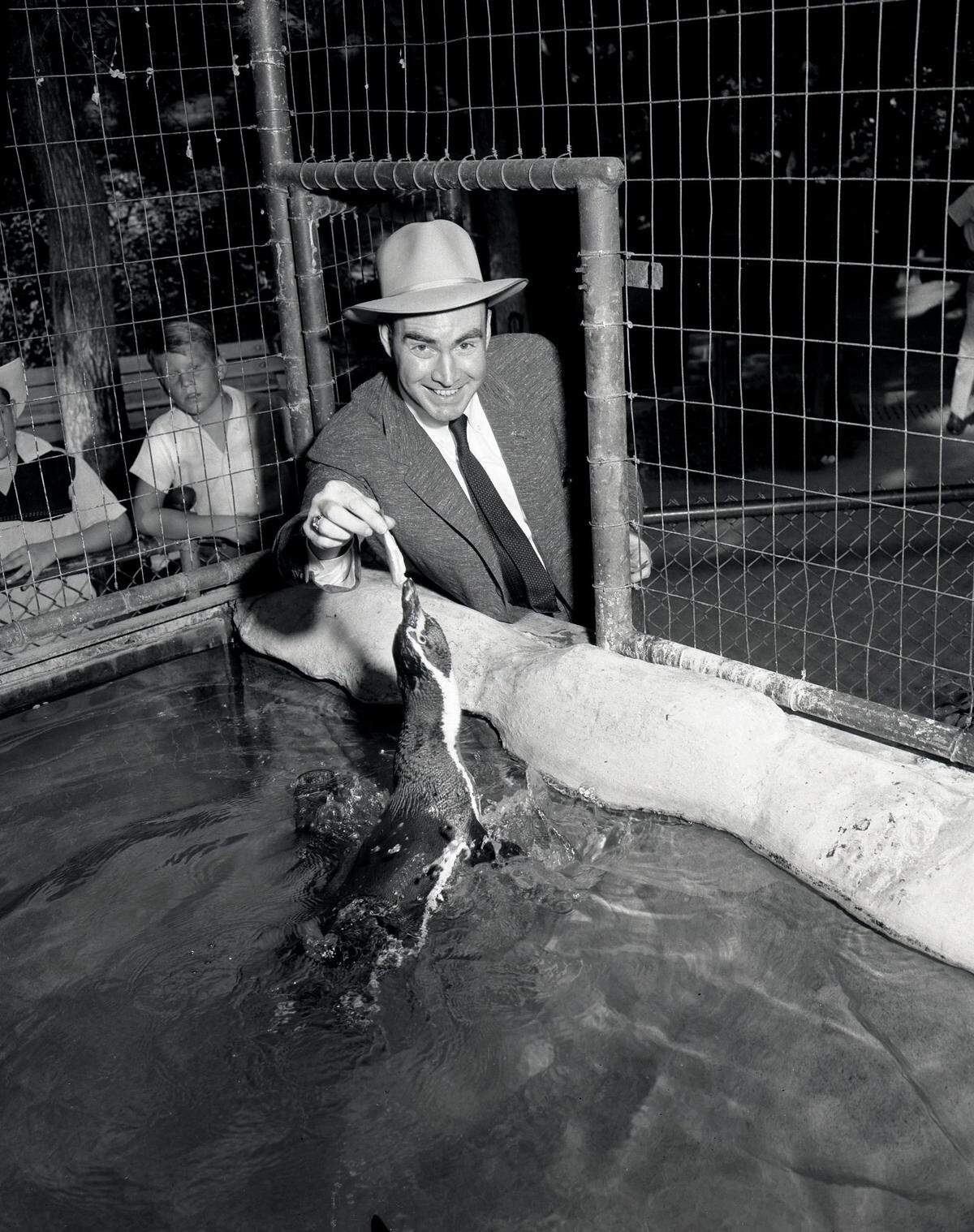 Aug. 27, 1956: Congressman Jim Wright feeds “Willie” the penguin at the Forest Park Zoo. Wright had persuaded Lima, Peru, authorities to send “Willie” and five other penguins to the zoo despite them not having a human escort.