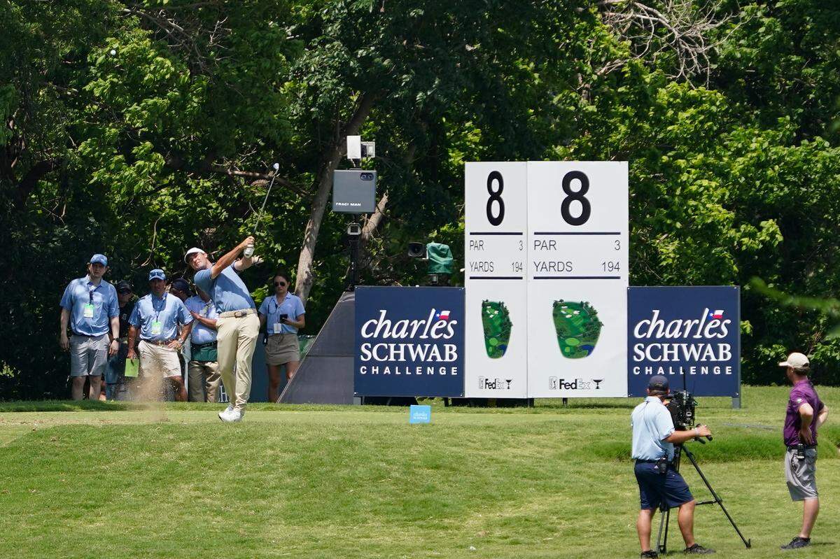 May 22, 2025; Fort Worth, Texas, USA; A general view of the eighth tee box as Scottie Scheffler plays his shot during the first round of the Charles Schwab Challenge golf tournament. Mandatory Credit: Raymond Carlin III-Imagn Images