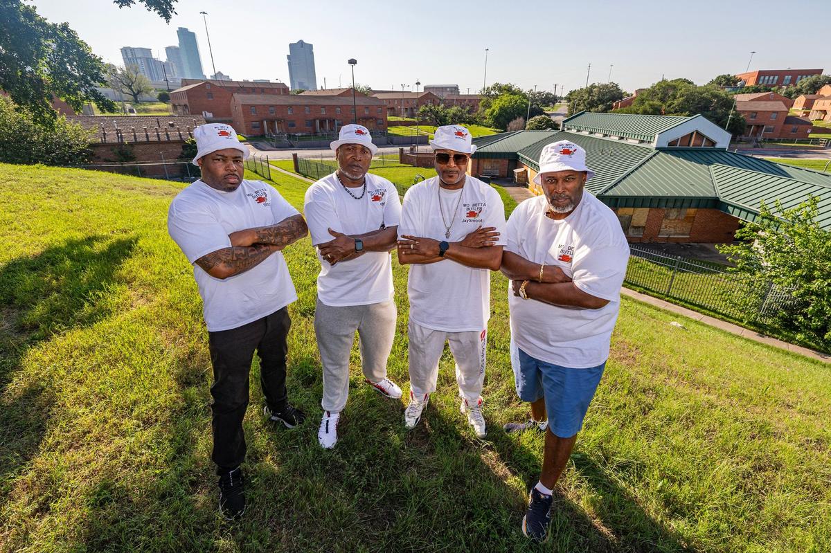 Former Butler Place residents, from left, Tremayne Kilgore, LC Timms, Joe Collier and Greg Wilson are photographed in Butler Place, the neighborhood where they grew up just outside of downtown Fort Worth. They remember it as a place where people looked out for each other.