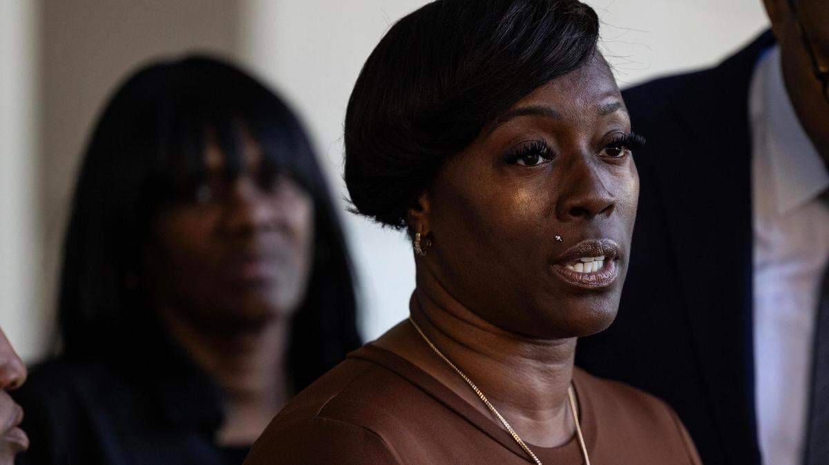 Crystal Mason and her attorneys speak to the media gathered regarding her acquittal in a high-profile voting rights case at the Tim Curry Criminal Justice Center in Fort Worth on Friday, March 29, 2024. The Texas Second Court of Appeals reversed Mason’s conviction on Thursday evening where she had faced five years in prison for submitting a provisional ballot in Tarrant County in 2016 that was never counted as a vote