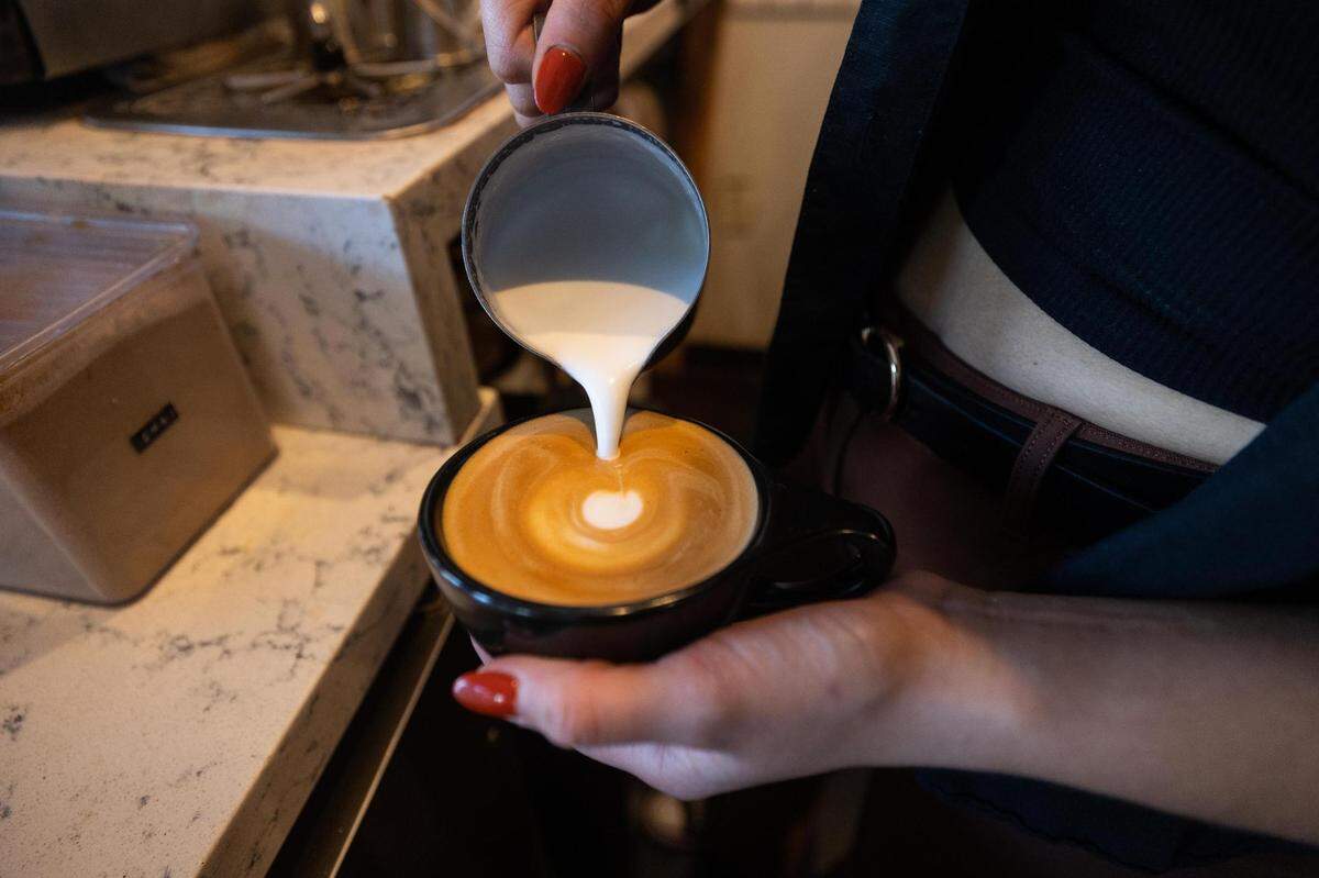 Jamie Dominguez makes an espresso drink at Ampersand.