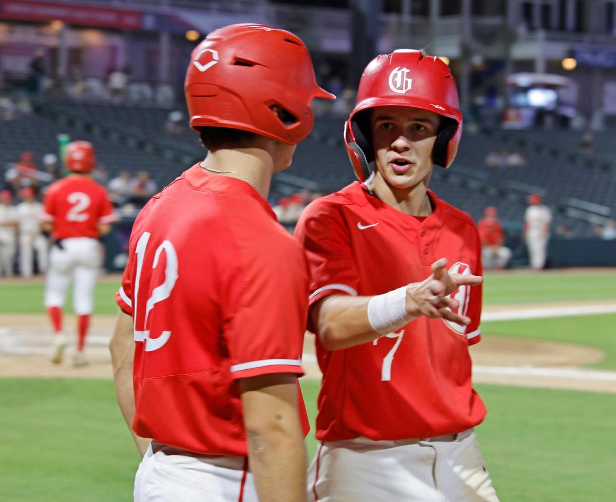 Grapevine short stop Connor Ray (7) gives some insight to first baseman Jarett Boswell (12) about the pitchers fast ball after notching their fifth run during a UIL 5A D2 semifinal baseball game at Riders Park in Frisco, Texas, Friday, May 30, 2025.