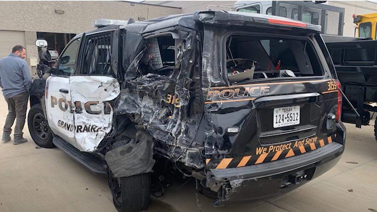 A Grand Prairie squad car took a beating after it was hit by a van.