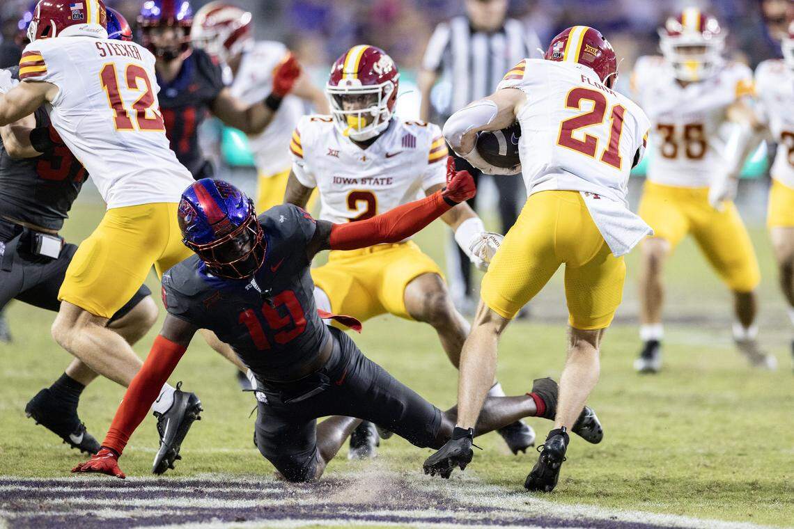 Iowa State running back Aiden Flora (21) makes a move on TCU safety Kylin Jackson (19) on the way to a punt return for a touchdown in the second half of a Big XII football game between the TCU Horned Frogs and the Iowa State Cyclones at Amon G Carter Stadium in Fort Worth on Saturday, Nov. 8, 2025.