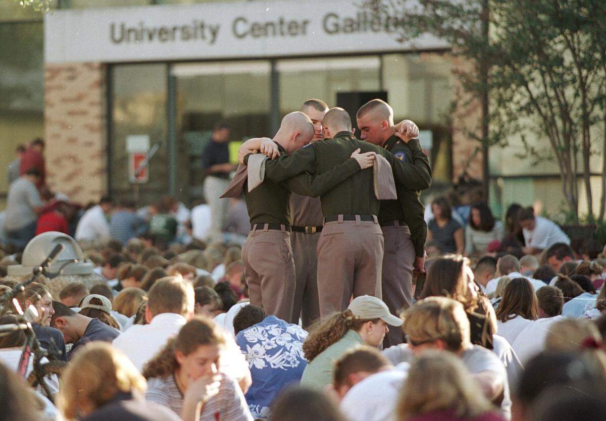 Students gathered at Rudder Fountain on the Texas A&M campus in memory of the students who were killed at the collapsed bonfire on Nov. 18, 1999.