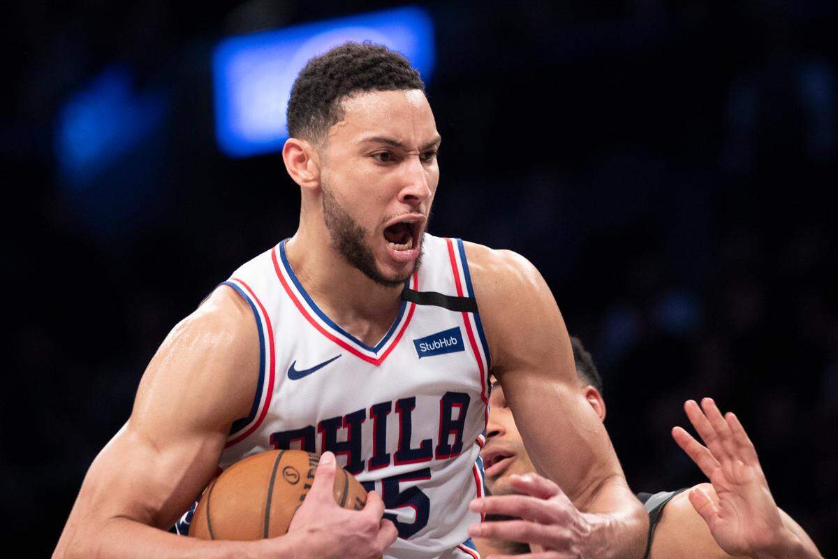 FILE - Philadelphia 76ers guard Ben Simmons reacts after grabbing a rebound during the second half of an NBA basketball game against the Brooklyn Nets in New York, in this Monday, Jan. 20, 2020, file photo. Simmons says he’s taking his ball and going home. The 76ers say they still want their disgruntled All-Star guard. (AP Photo/Mary Altaffer, File)