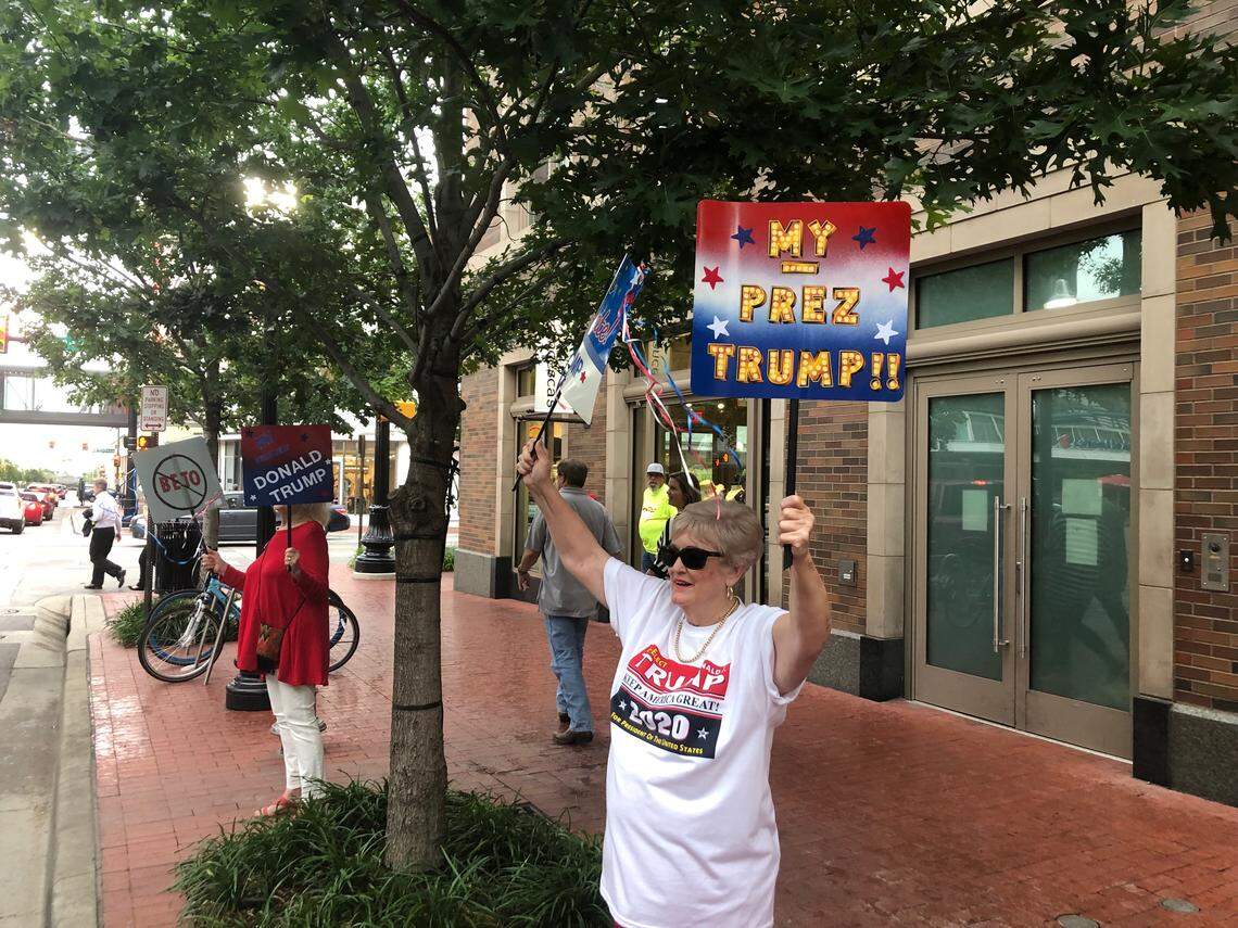 Carol Guarnieri from Fort Worth protested the Beto O’Rourke rally from across the street in downtown Fort Worth Friday night.