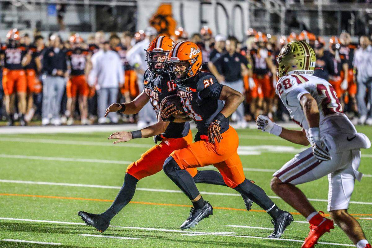 Aledo’s Kaden Winkfield (21) scores one of his touchdowns against Saginaw in a Class 5A Division I bi-district playoff game on Thursday, November 13, 2025 at Tim Buchanan Stadium in Aledo, Texas.
