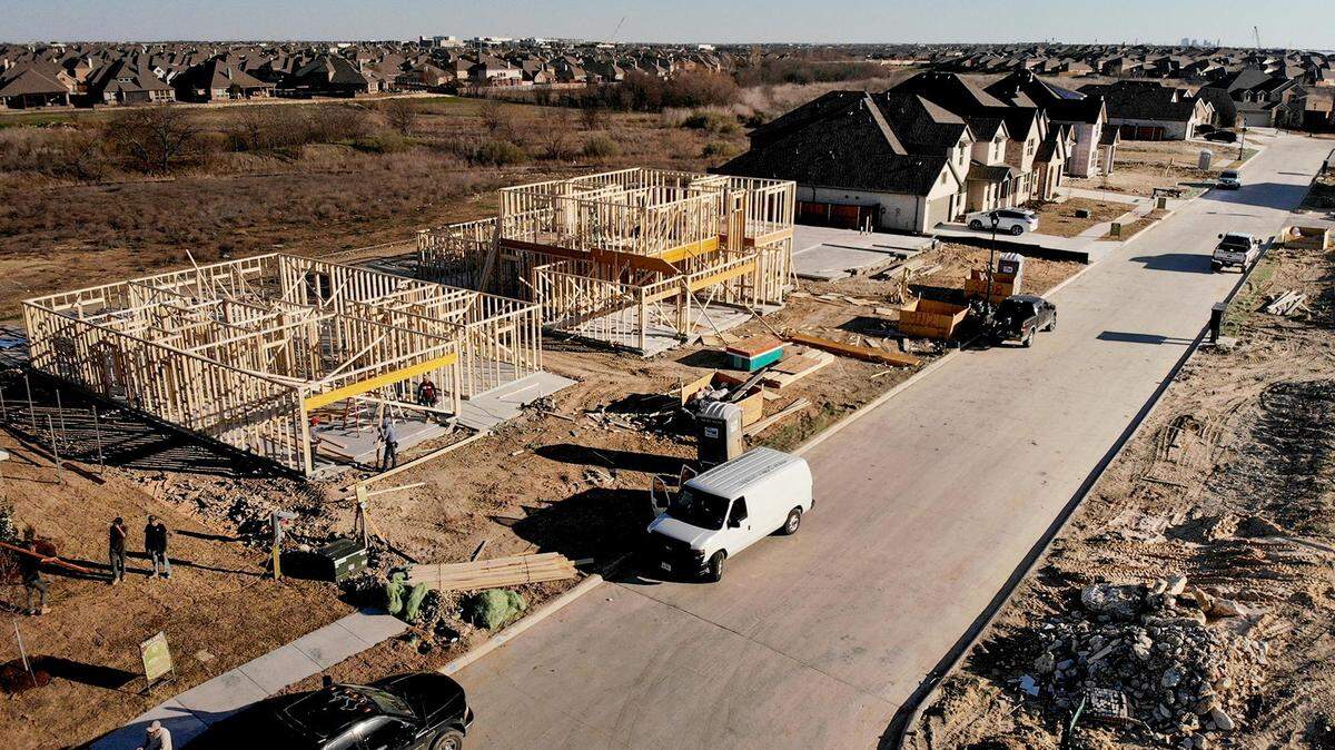 Ariel view of homes framed and under construction.