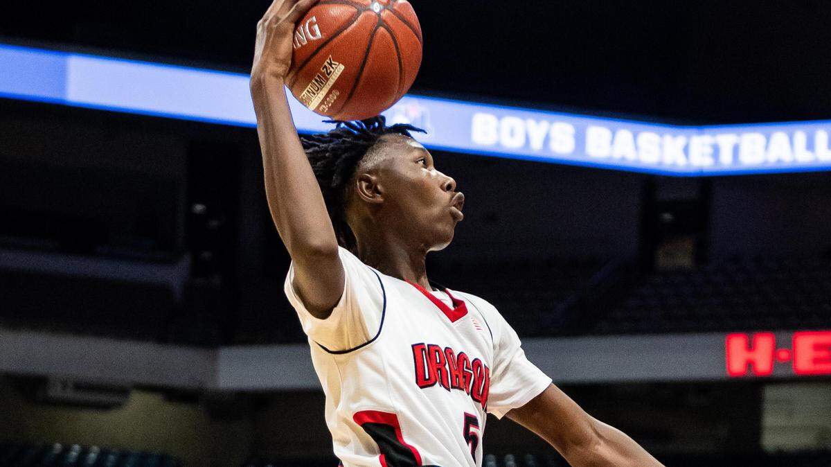 Shelbyville junior Jay Buckley goes up for a shot vs. Hearne in the 2A state semifinals at the Alamodome, Friday March 8, 2019.