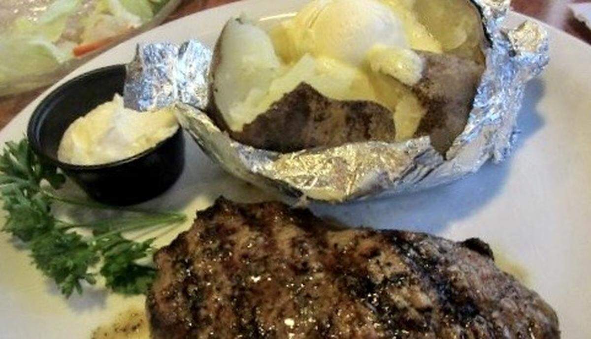 A sirloin with baked potato and salad was a recent special at Bobby V’s.