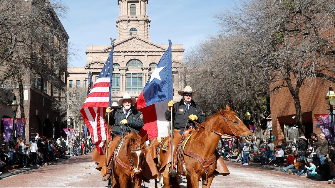 Riders from the Rockwall Sheriffs Posse ride down Main Street during the 2023 Fort Worth Stock Show and Rodeo parade in downtown Fort Worth, Texas, Saturday, Jan. 14, 2023. (Special to the Star-Telegram Bob Booth)
