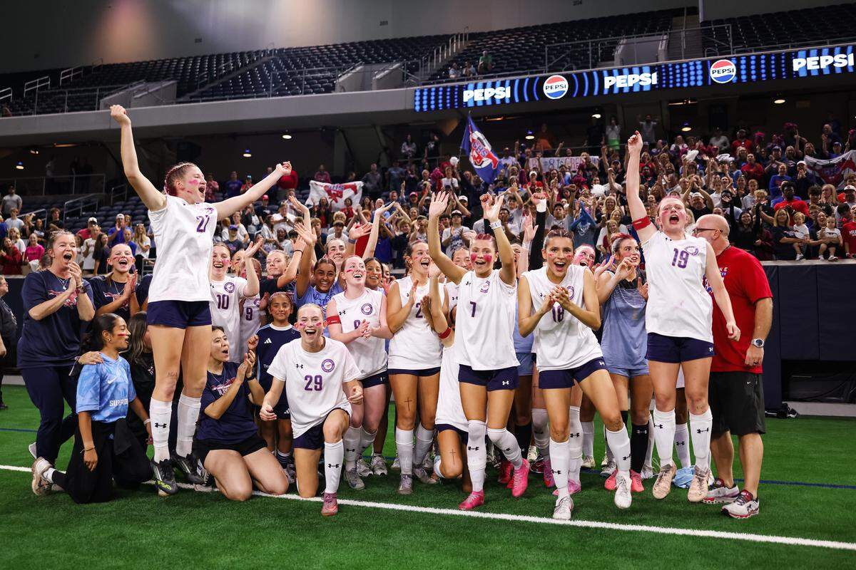 Grapevine players celebrate in unison after defeating Frisco Wakeland in a Class 5A Division II state semifinal Friday at the Ford Center in Frisco.