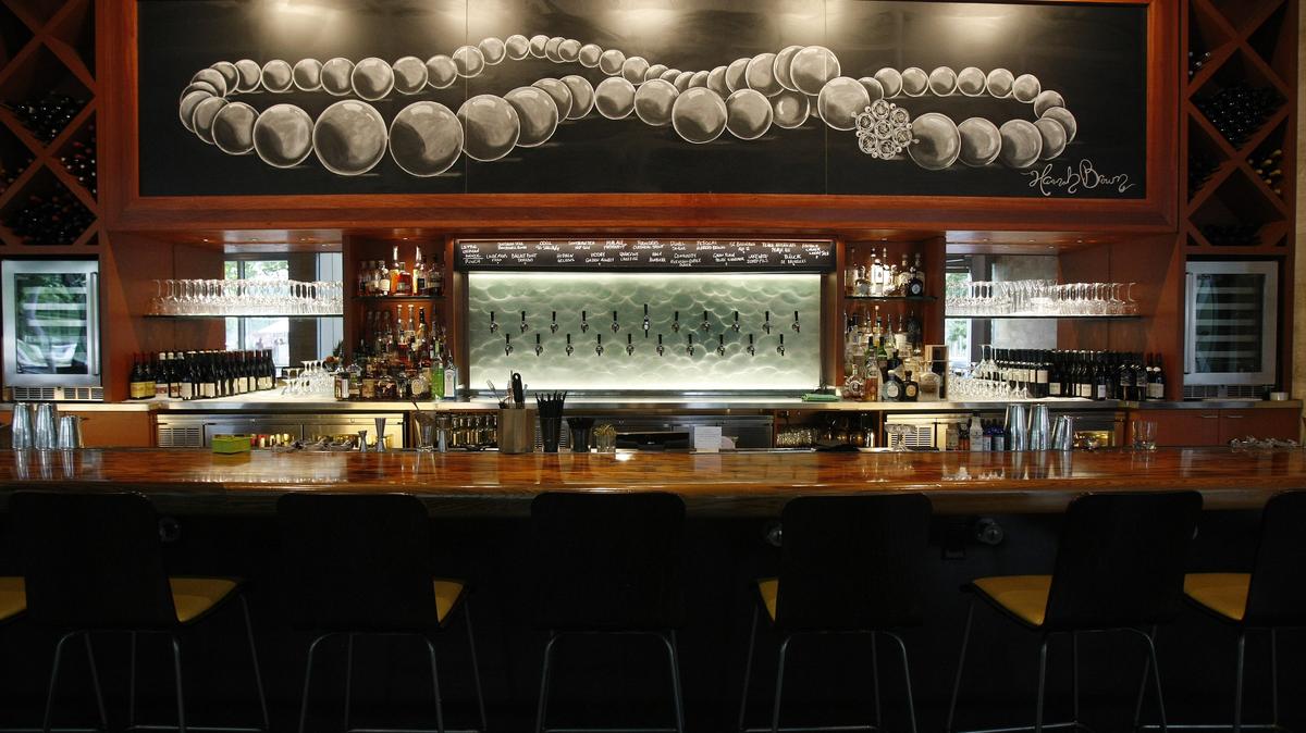 The bar area at Lark on the Park in Dallas. The restaurant, across from Klyde Warren Park in downtown Dallas, is known among other things for its beer selection and for rotating chalkboard art by local artists, such as the drawing above the bar. Lark’s owners announced that it will close Dec. 2, and that they expect to open a new concept in the same location by summer 2019.