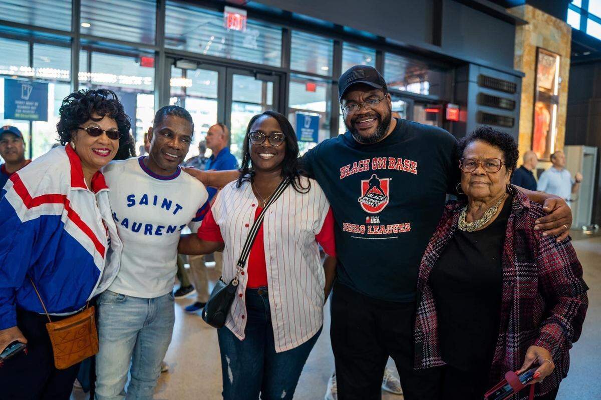 Kirk Franklin (white shirt) was honored by the Texas Rangers at a game in October 2022.