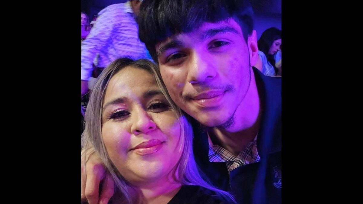 Emiliano, pictured on the right, has his arm around his mother on the left.