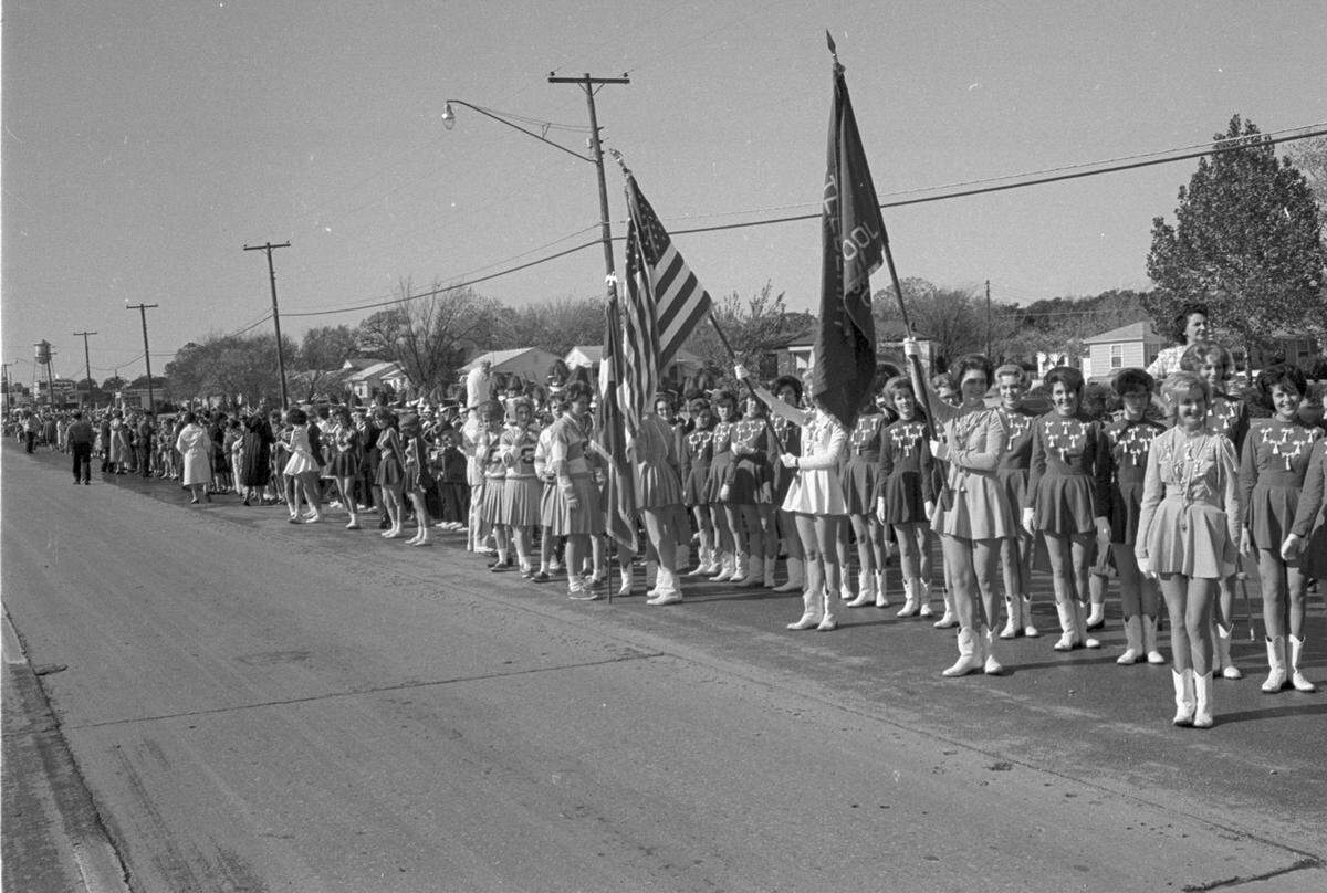 President John F. Kennedy’s motorcade through Fort Worth on the way to Carswell AFB, with school children lining the street, 11/22/1963