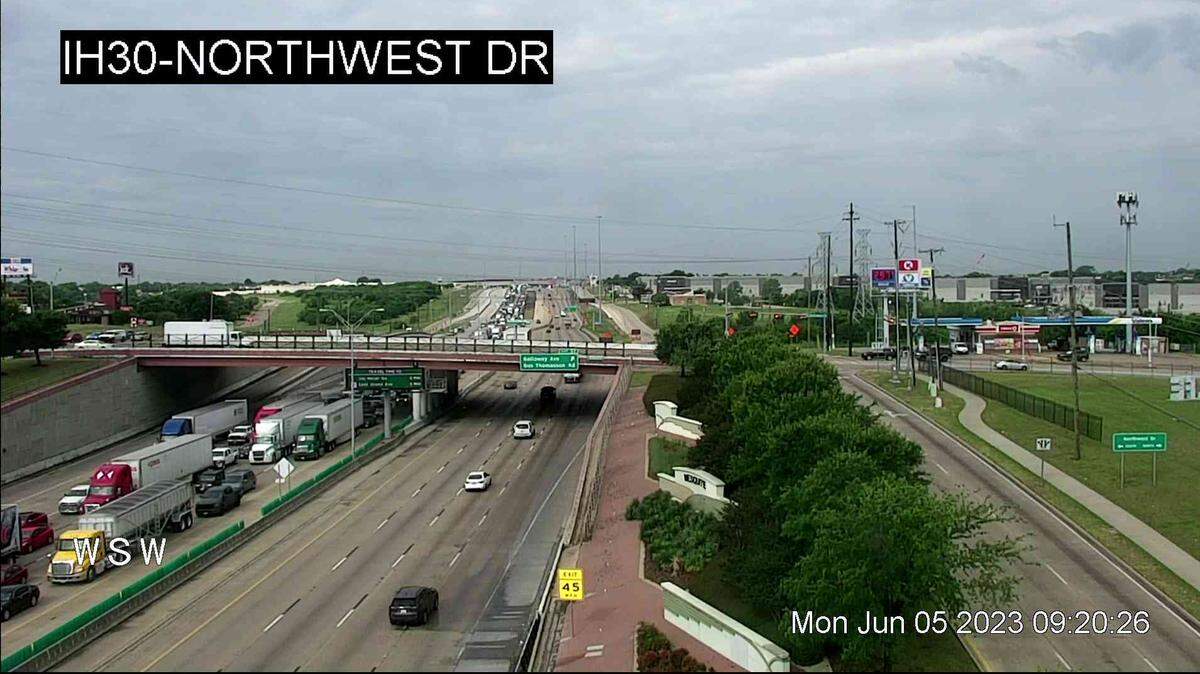 A fatal accident on Interstate 30 near Broadway Boulevard involving an 18-wheeler closed the eastbound and westbound lanes of I-30 for about six hours on Monday morning, June 5, 2023, according to Garland police. A TxDOT traffic camera shows traffic that was backed up west of the accident scene.
