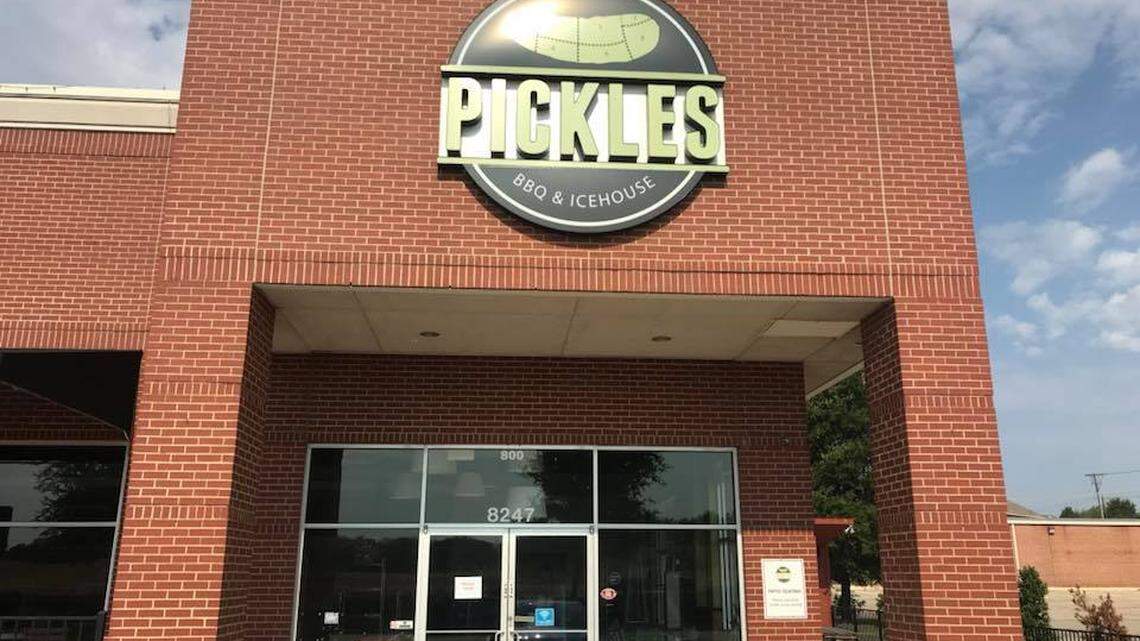 Pickles BBQ & Icehouse on Rufe Snow Drive in Watauga. The sign on the door says “business closed.”