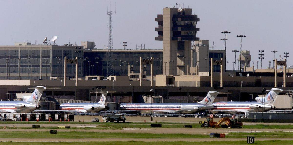 American Airlines planes remain idle at Terminal C at Dallas-Fort Worth International Airport on Sept. 12, 2001. An FAA-enforced halt on all domestic commercial air traffic was still in place Wednesday afternoon in the wake of Tuesday's terrorist attacks in New York and Washington.