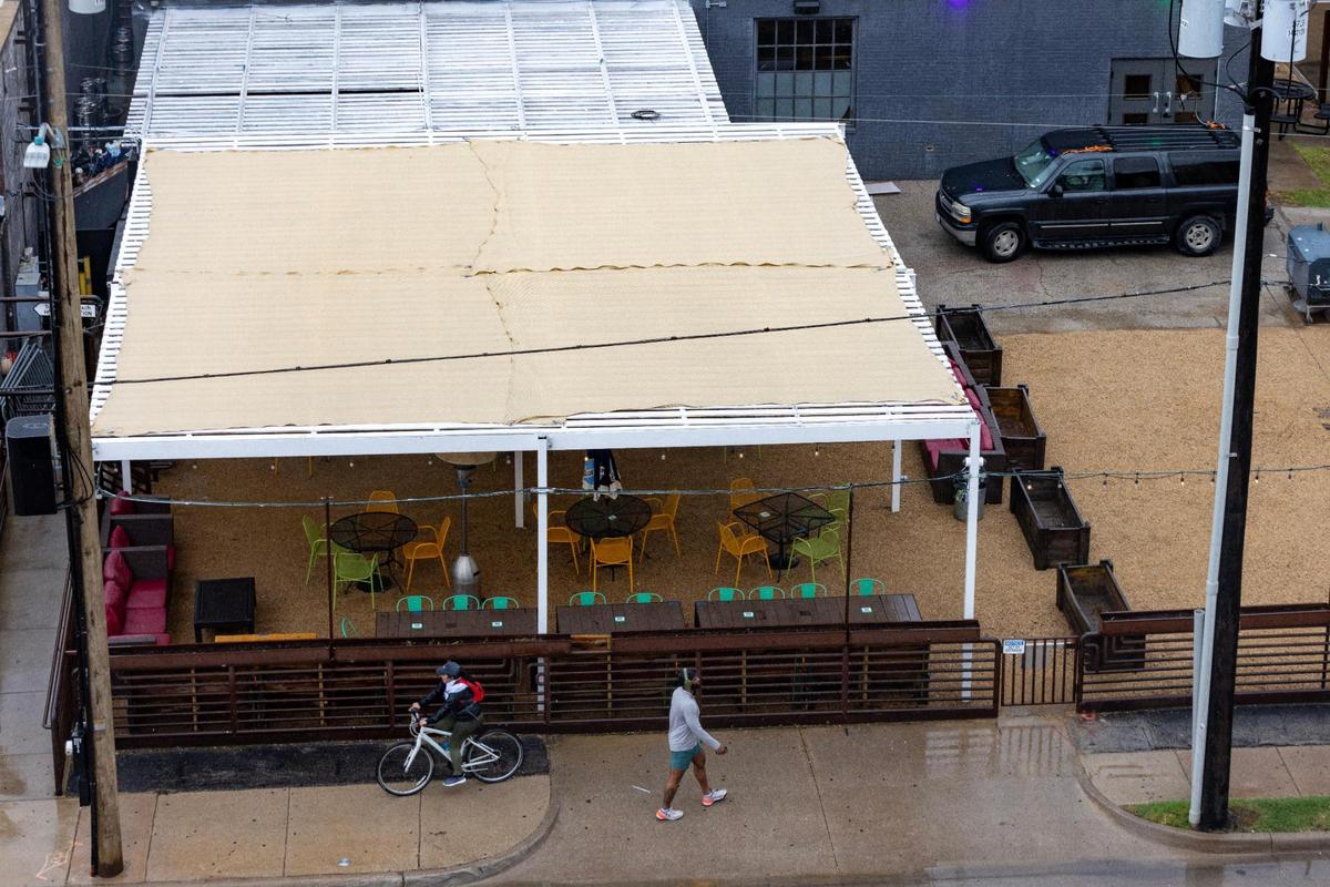 The patio of the Trinity College Irish Pub in Fort Worth on Wednesday, April 26, 2023. The city is considering a rezoning change to require bars and nightclubs to obtain a special permit before opening.